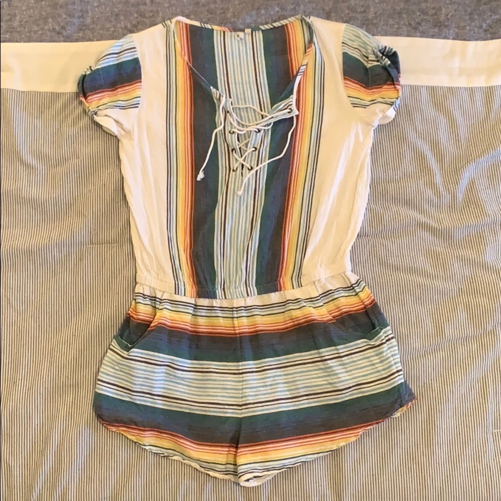 Rip curl rainbow romper, beach style.